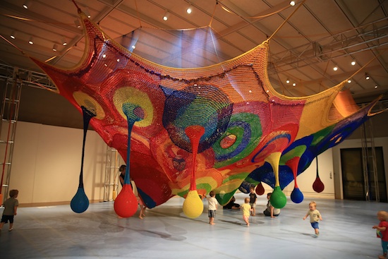 a large scale multicolored yarn sculpture 