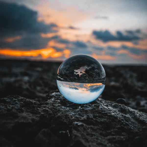 a marble reflecting the sunset