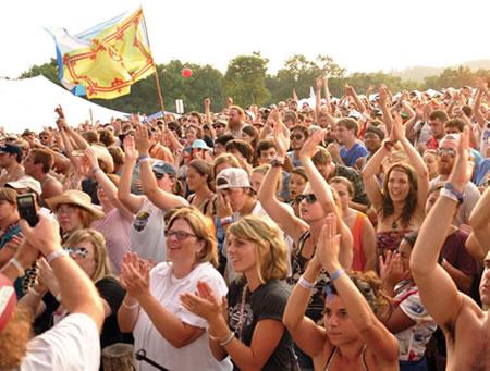 Enthusiastic concertgoers at the tenth anniversary of FloydFest in Floyd, Virginia