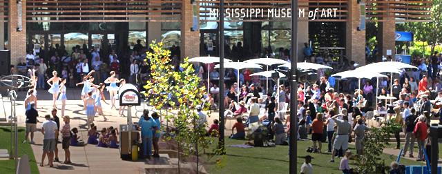 Crowd in the Art Garden plaza in front of the Mississippi art Museum watching a performance