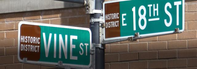 Street signs at the interseation of VIne and 18th Street in Kansas CIty