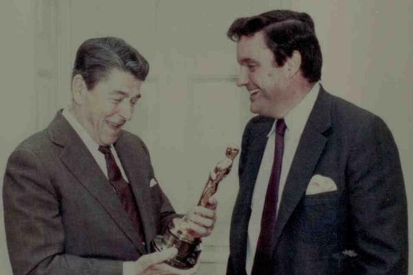 NEA Chair Frank Hodsoll shows NEA's special Academy Award to president Ronald Reagan
