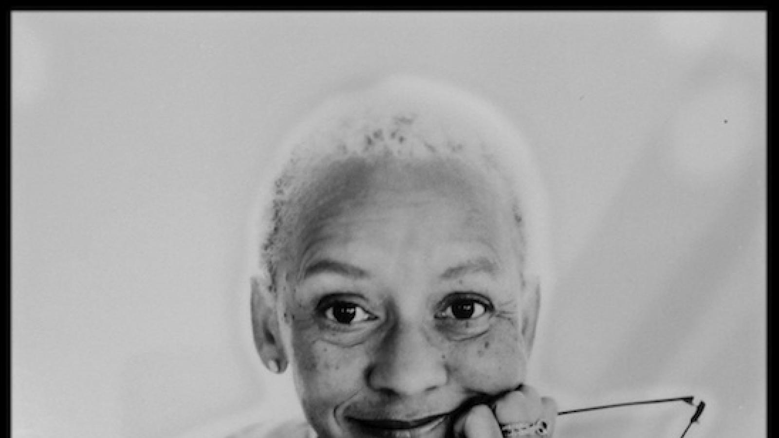 black and white photo of older African-American woman with natural short gray hair