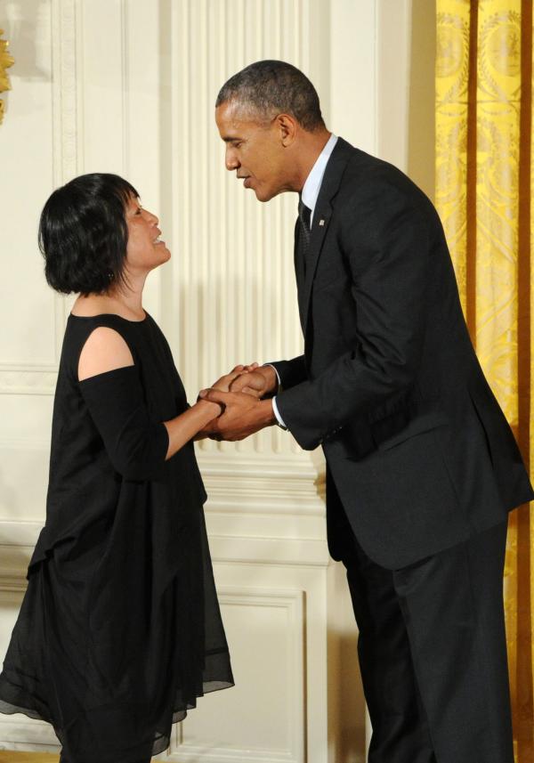 Billie Tsien receiving an award from Barack Obama