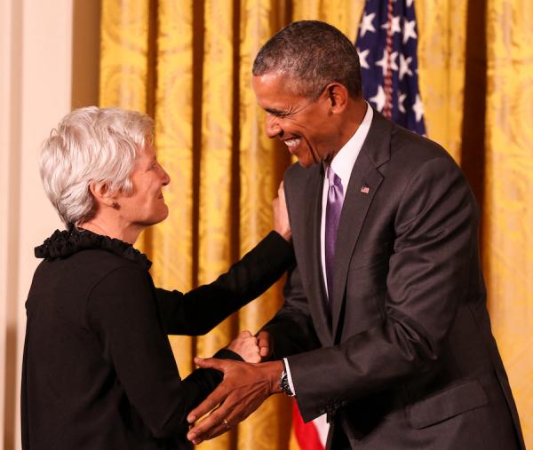 Ann Hamilton receives her medal from President Obama.