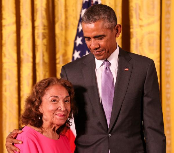 Miriam Colón receives her medal from President Obama