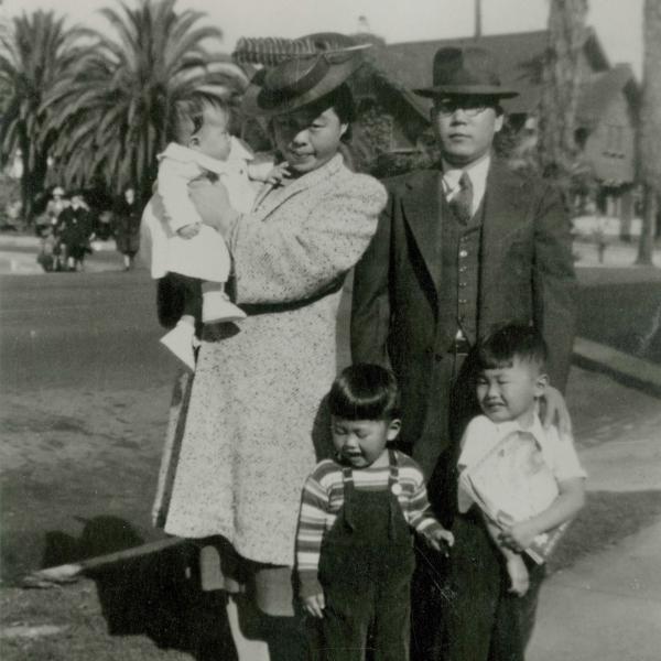 Japanese family standing outside in early 1940s