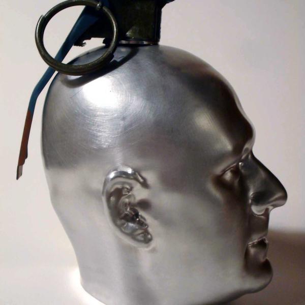 a grenade shaped like a human head