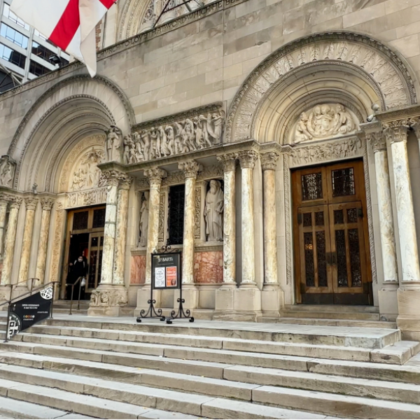 Photo of the front of the main entrance to the St. Bartholomew’s Church on Park Avenue showing carved sculptures above the doors