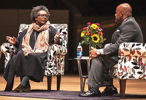 Claudia Rankine and Mayor Michael B. Hancock seated on stage