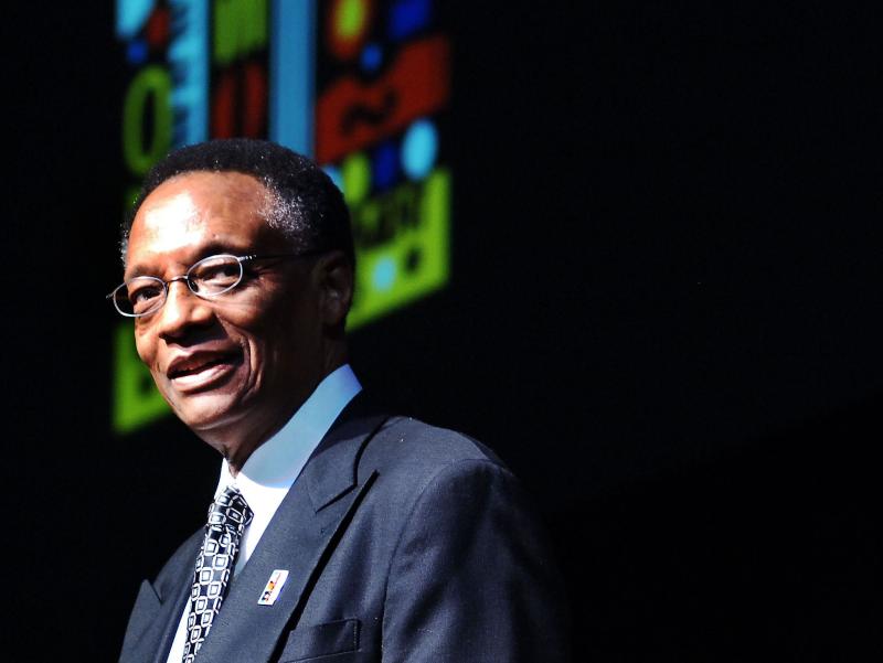 Ramsey Lewis A photo of a man with a colorful image behind him.