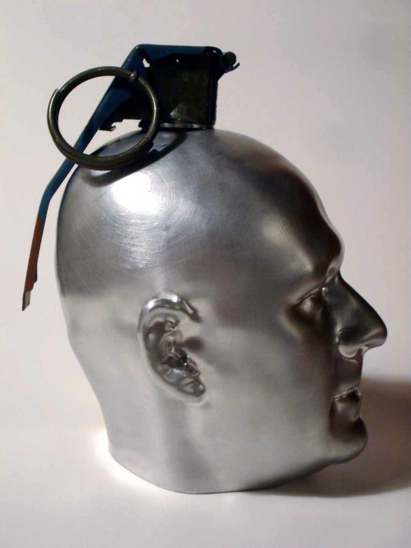 a grenade shaped like a human head