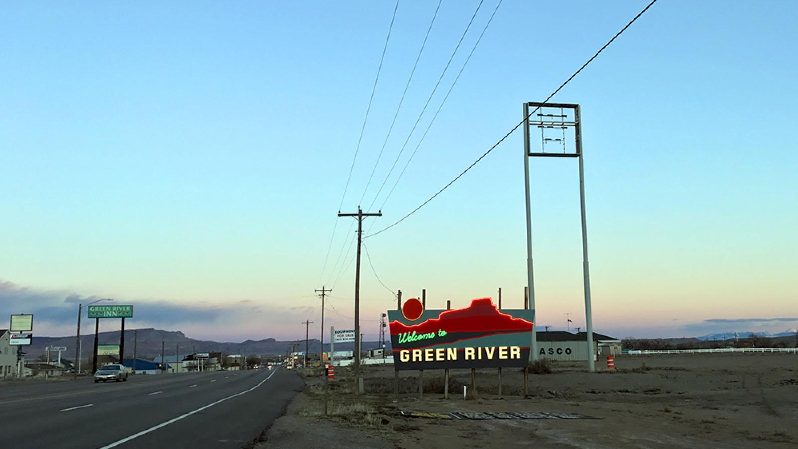 A neon sign outside the town of Green River, Utah.