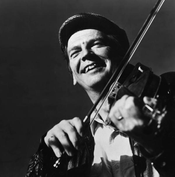 A man playing a fiddle.