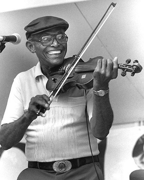 Man playing a fiddle.
