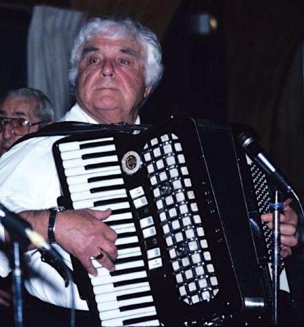 Man playing an accordion.