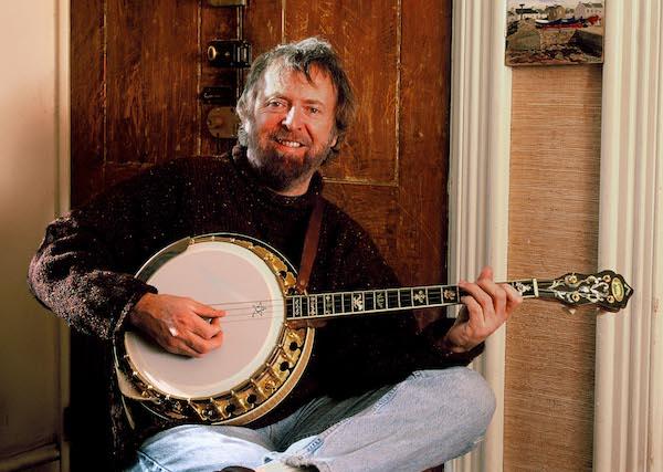 A man playing a banjo.