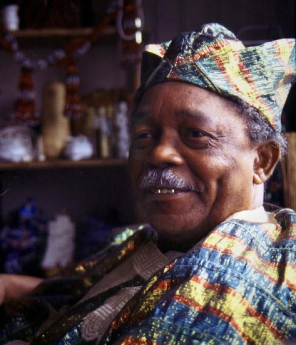 A man wearing traditional african hat.