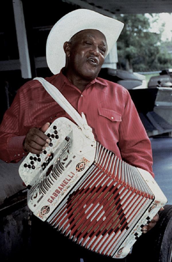 A man playing an accordion.